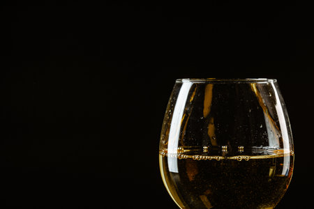 Wine glass on a dark background, studio shot