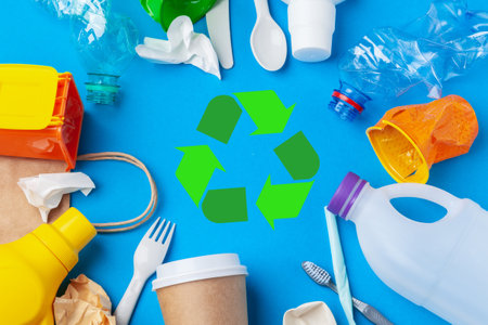 Eco concept with recycling symbol on table background top view
