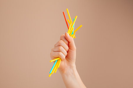 Hands holding plastic garbage, pollution and recycling conceptの写真素材