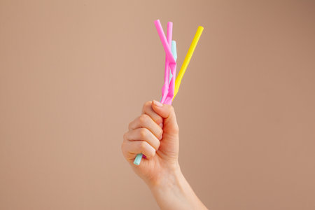 Hands holding plastic garbage, pollution and recycling conceptの写真素材