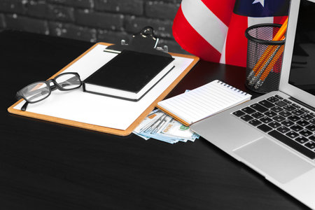 4th of July American Independence Day USA flags decorations in office desk with computerの写真素材