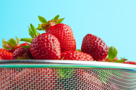 Fresh ripe red strawberries on gardens tableの写真素材