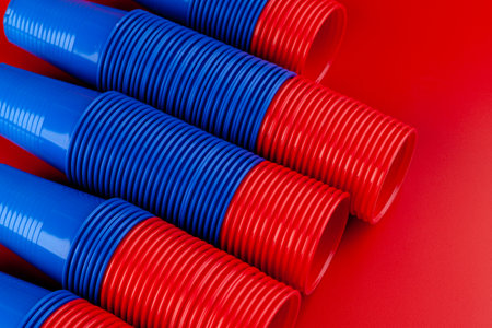 Plenty of plastic empty colorful cups close upの写真素材