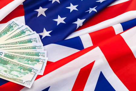 et, finance and nationalism concept - close up of american flag and cash moneyの写真素材