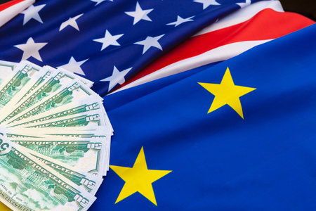 et, finance and nationalism concept - close up of american flag and cash moneyの写真素材
