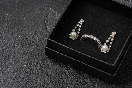 Jewelry box with earrings on a gray backgroundの写真素材