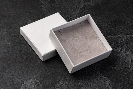 Small jewelry box on gray background close upの写真素材