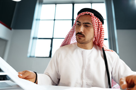 Young successful arab businessman working in the officeの写真素材