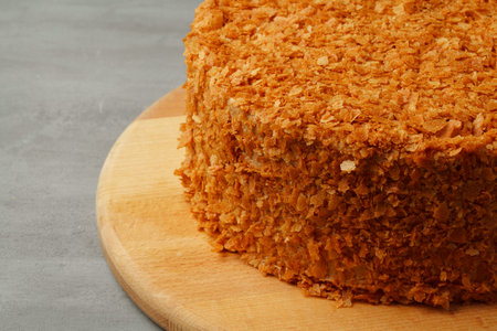 Delicious cake on gray background close upの写真素材