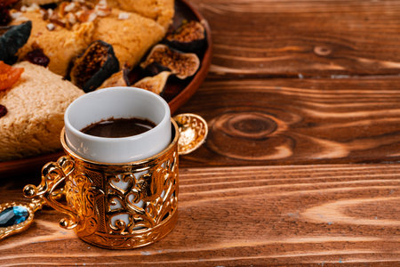 Close up photo of turkish national desserts with cup of coffeeの写真素材