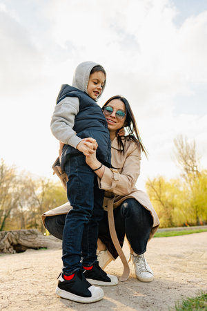 Single mother spending some time at the park with her little sonの写真素材
