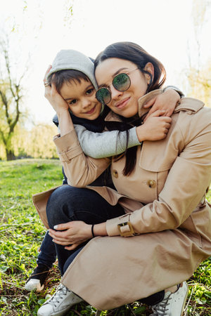 Single mother spending some time at the park with her little sonの写真素材