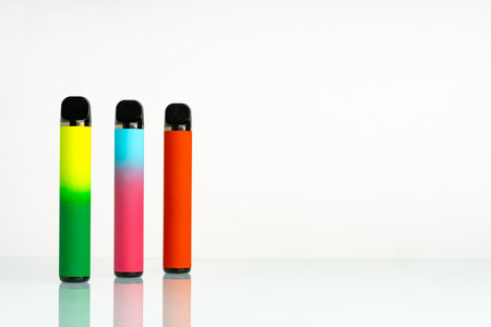 disposable electronic cigarettes on white backgroundの写真素材