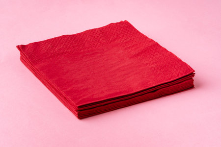 Paper napkins on pink background close upの写真素材