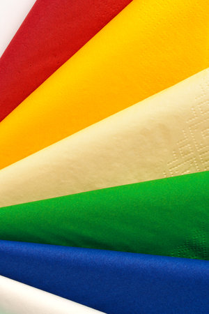 Colorful stack of paper napkins on white backgroundの写真素材