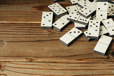 Domino tiles on wooden background close upの写真素材