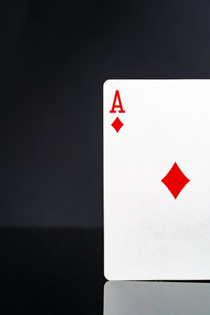 Playing cards on black background studio shotの写真素材