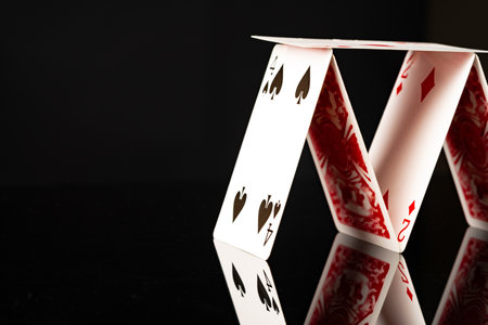 Playing cards on black background studio shot