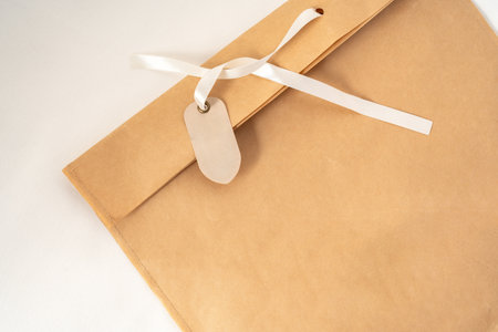 Craft bag with white label tag on white background