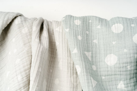 Muslin baby blanket on white background studio shotの写真素材