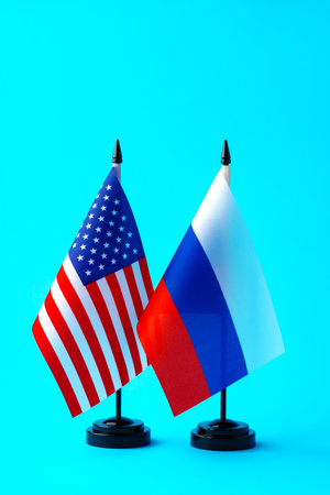Small flags of Russia and USA on flagpoles close upの写真素材