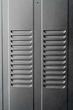Metal ventilation grille in a refridgerator close up