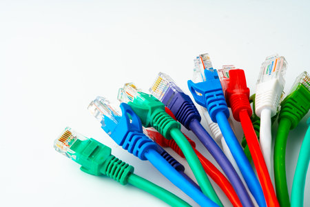 Colorful network cables switch on white background