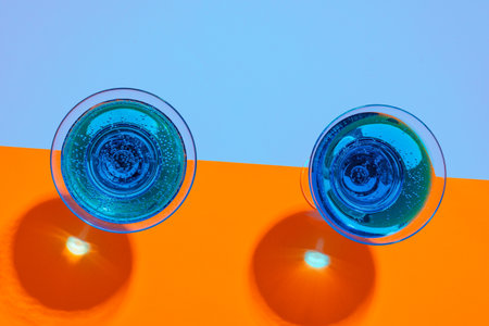 Cold and refreshing cocktails on color backgroundの写真素材