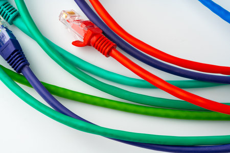 Colorful network cables switch on white background
