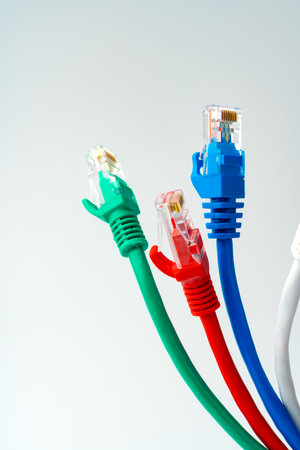 Colorful network cables switch on white background