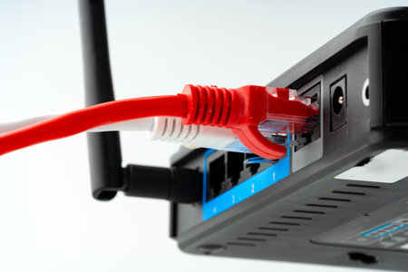 Modern router with cables plugged in close upの写真素材