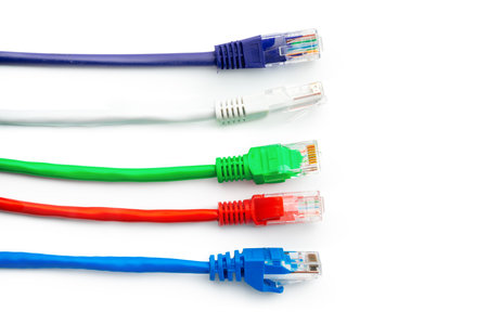 Colorful network cables switch on white background