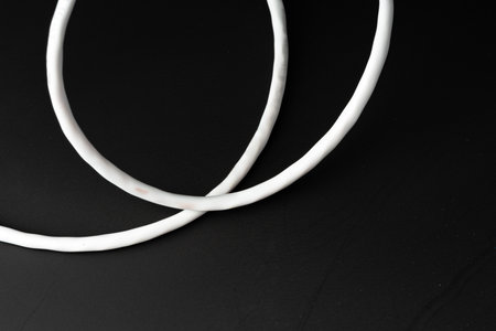 Network cable on black background studio shot