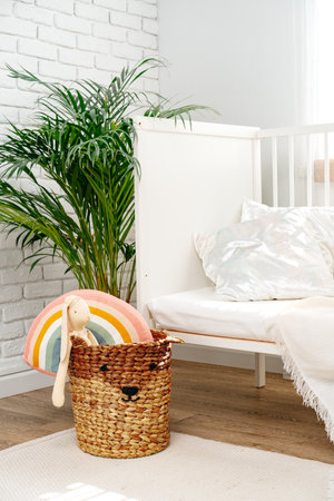 Wicker basket for toys in the childrens roomの写真素材