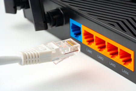 Modern router with cables plugged in close up
