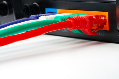 Modern router with cables plugged in close up