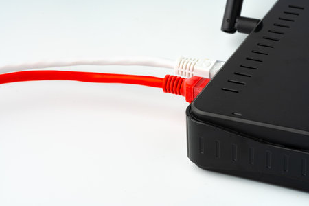 Modern router with cables plugged in close upの写真素材