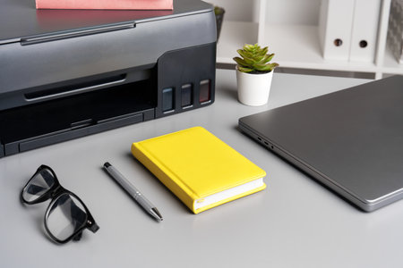 Close up of modern printer in the office