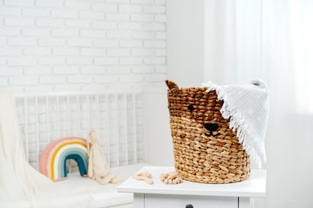 Wicker basket for toys in the childrens roomの写真素材