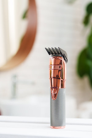 Electric shaver for men in a bathroom close upの写真素材