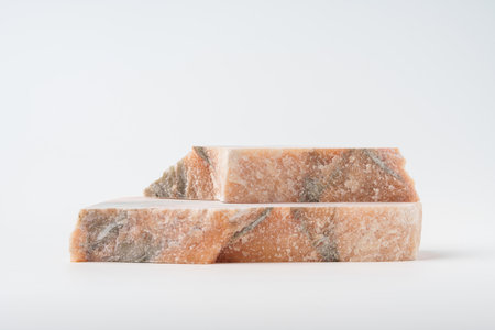 Pieces of polished granite isolated on white backgroundの写真素材