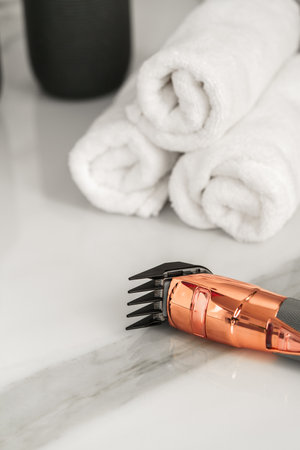 Electric shaver for men in a bathroom close up