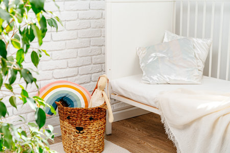 Wicker basket for toys in the childrens roomの写真素材