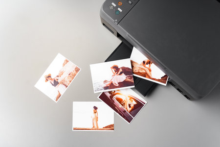 Modern laser printer printing color photos of women close upの写真素材