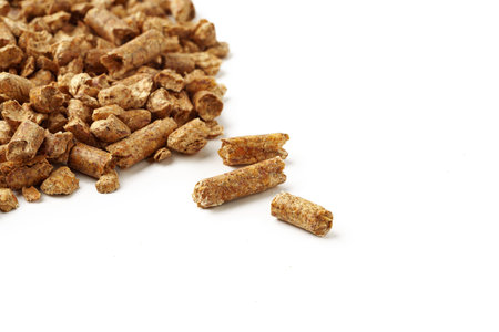 Wooden filler for cat litter box isolated on white background