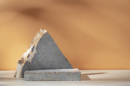 Stone display mockup for advertising against beige background