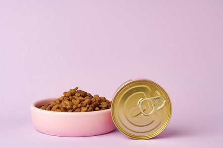 Cat food on pink background in studioの写真素材