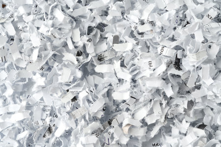 Shredded paper on white background close up
