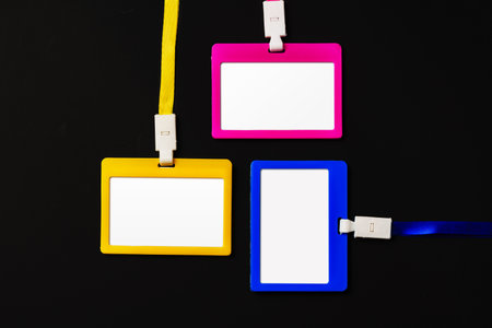 Blank badges on black background top viewの写真素材