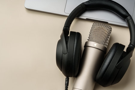 Headphones and microphone on the table close up
